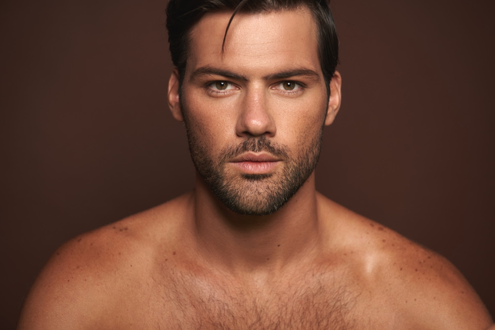 male model on brown back ground
