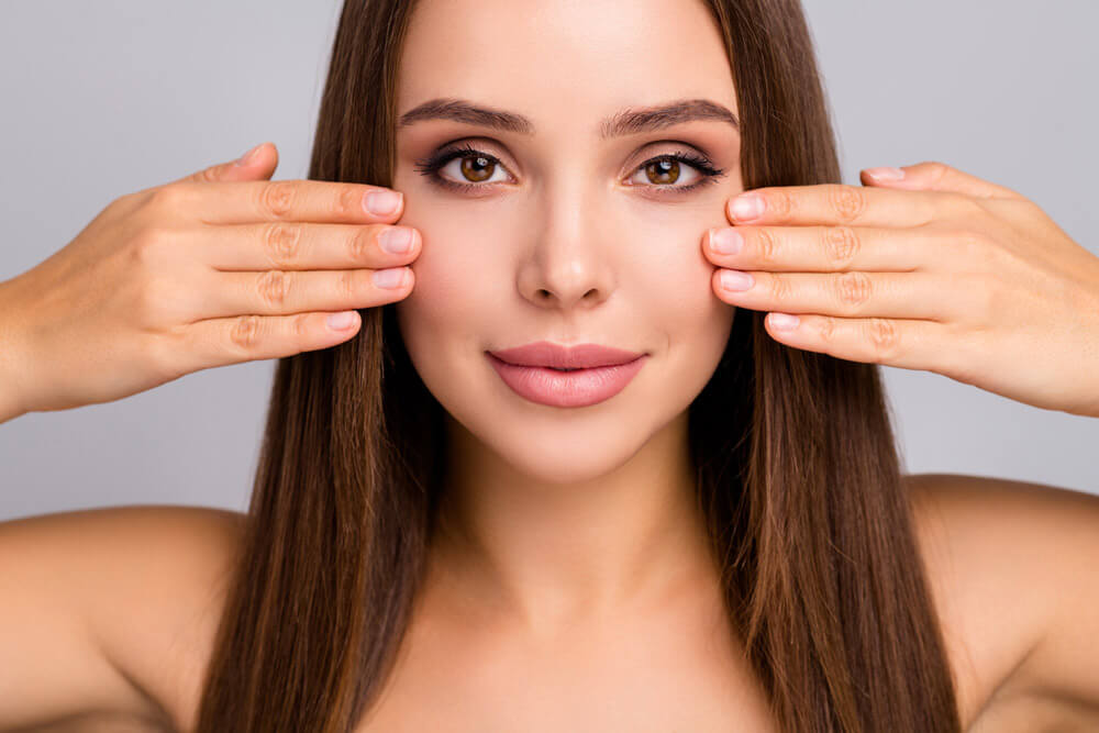 woman smiling with clear skin