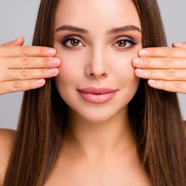 woman smiling with clear skin